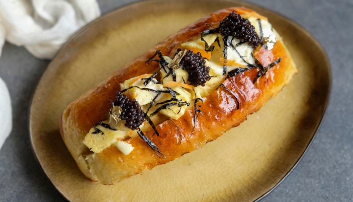 Delicious homemade pastry. Tamago Soft Bun with Caviar.
