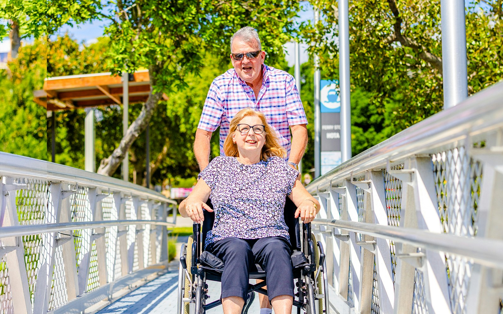 Differently abled woman in wheelchair boarding cruise on Gold Coast HOHO Sightseeing Cruise.