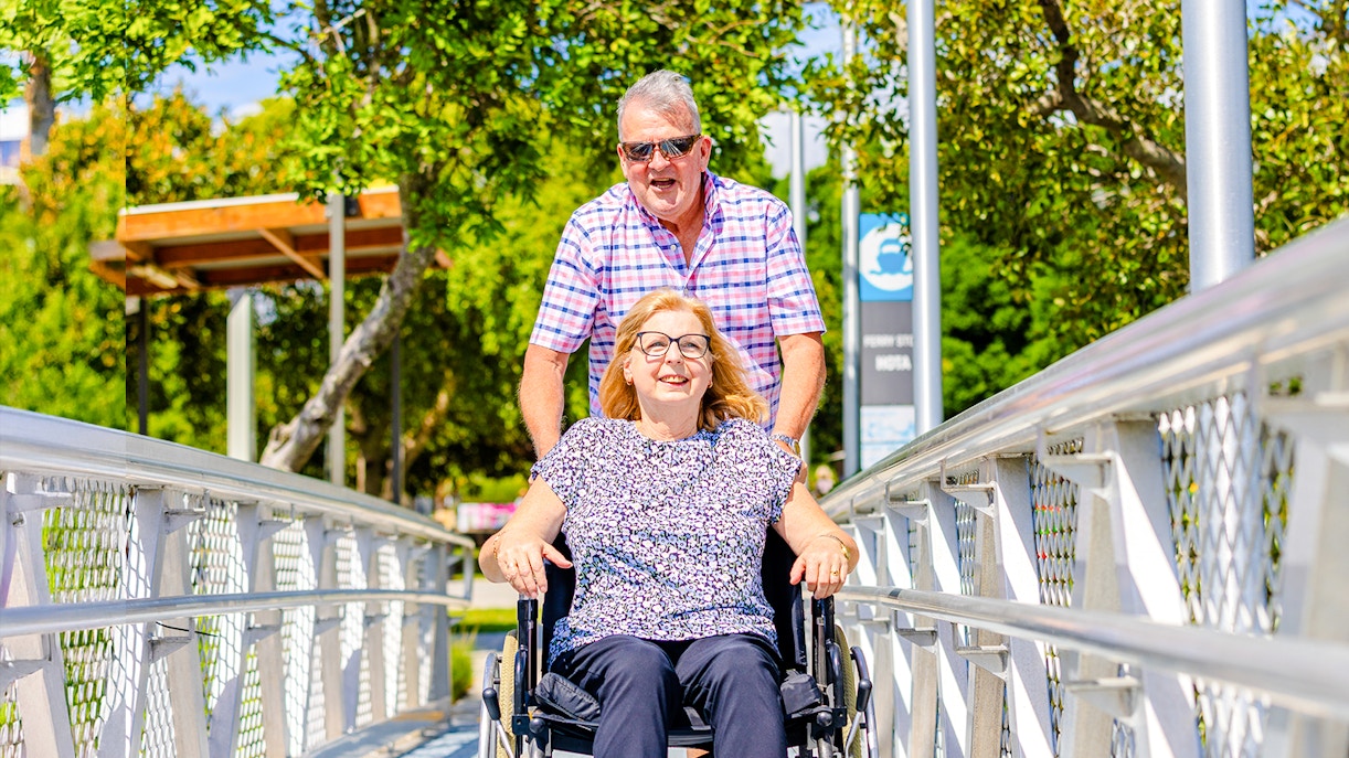 Differently abled woman in wheelchair boarding cruise on Gold Coast HOHO Sightseeing Cruise.