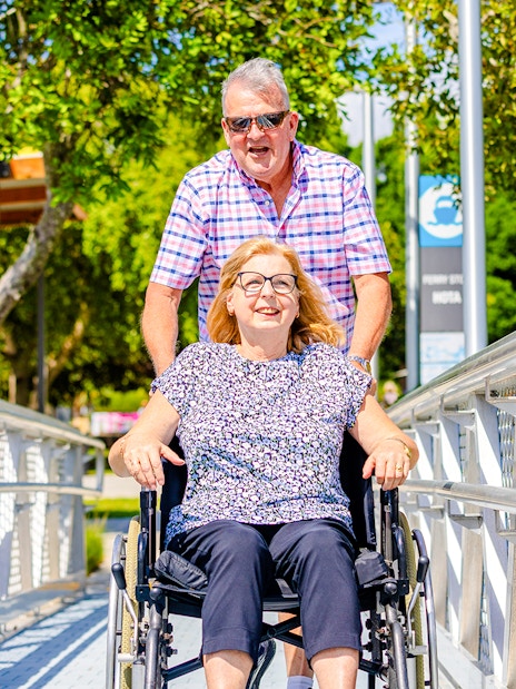 Differently abled woman in wheelchair boarding cruise on Gold Coast HOHO Sightseeing Cruise.