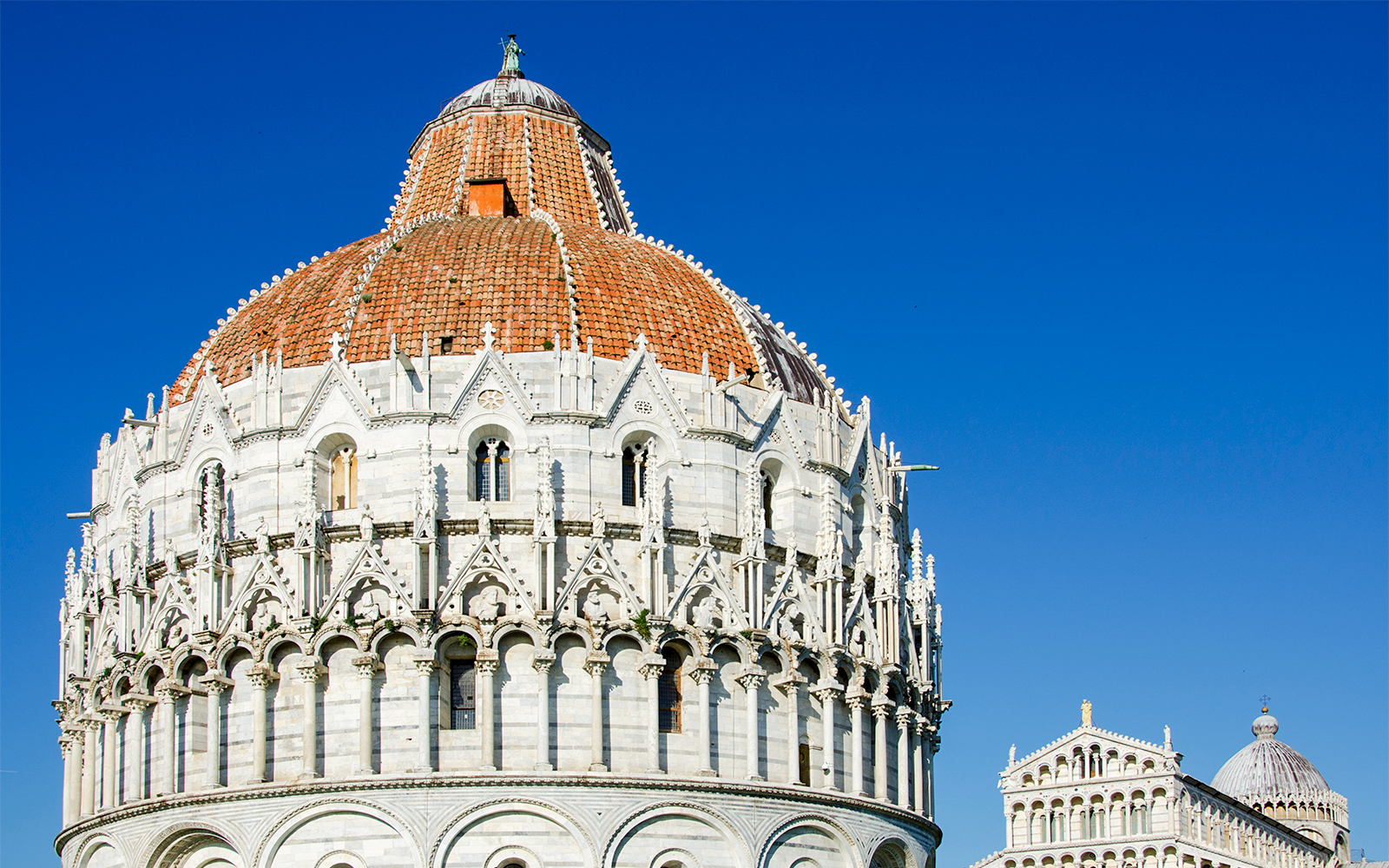 Pisa Baptistery dome interior with intricate architectural details, Pisa, Italy.