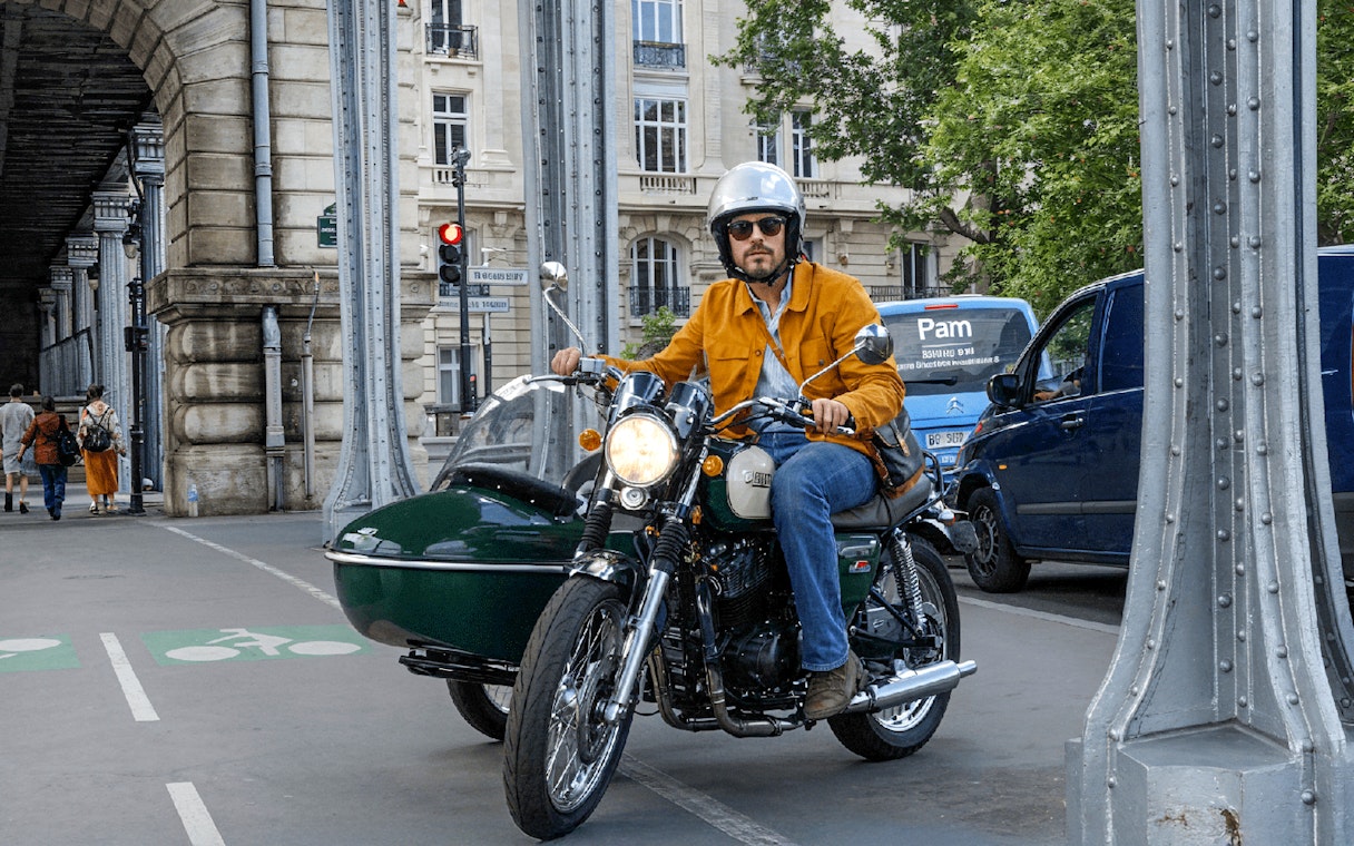 Sidecar motorcycle tour under Paris bridge.