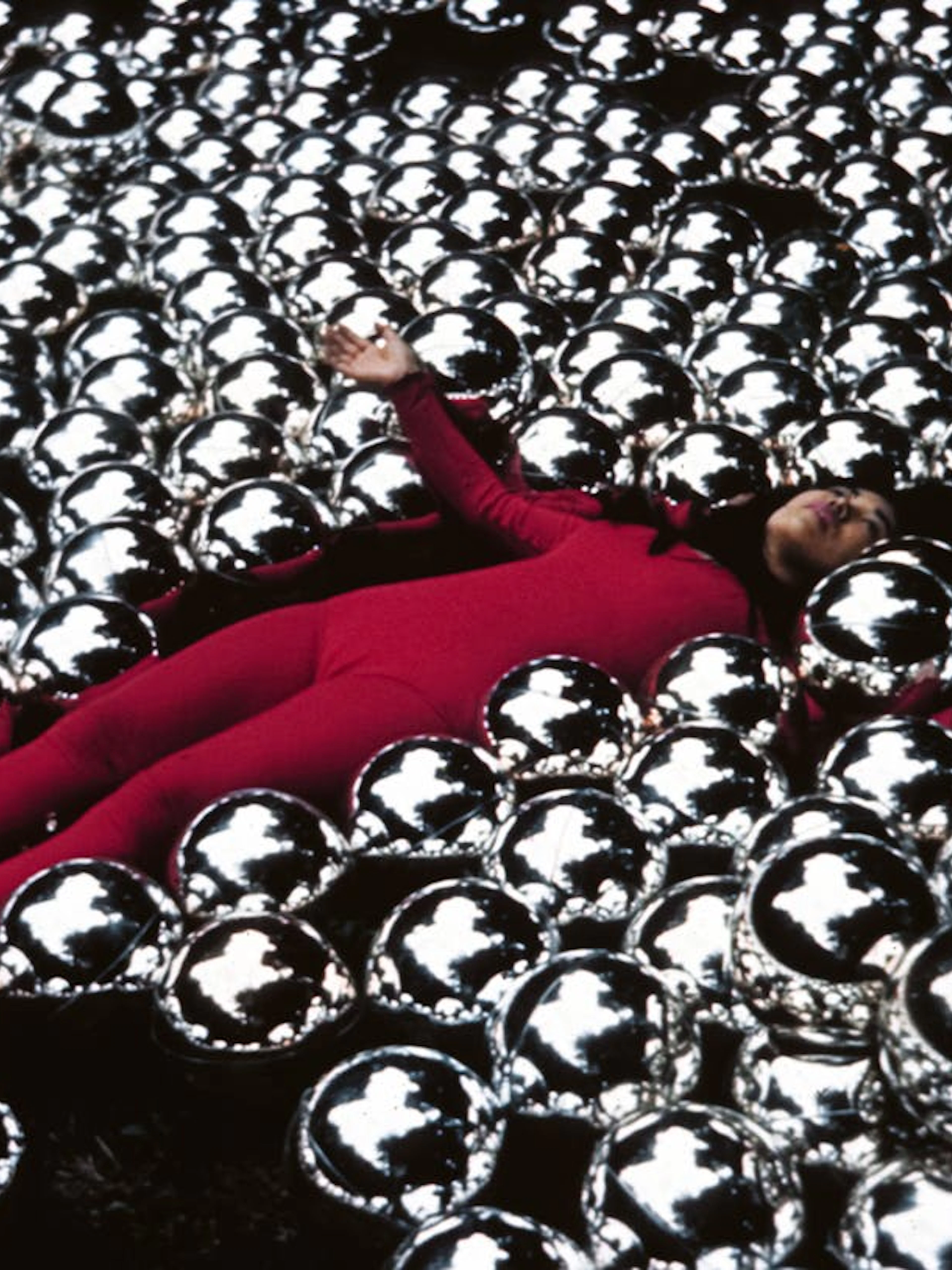 Yayoi Kusama installation with reflective spheres at Stedelijk Museum Amsterdam.