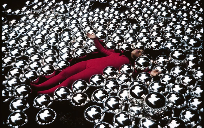 Yayoi Kusama installation with reflective spheres at Stedelijk Museum Amsterdam.
