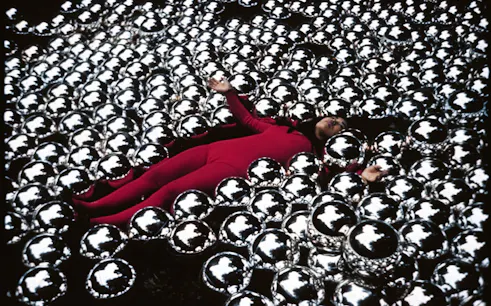 Yayoi Kusama installation with reflective spheres at Stedelijk Museum Amsterdam.
