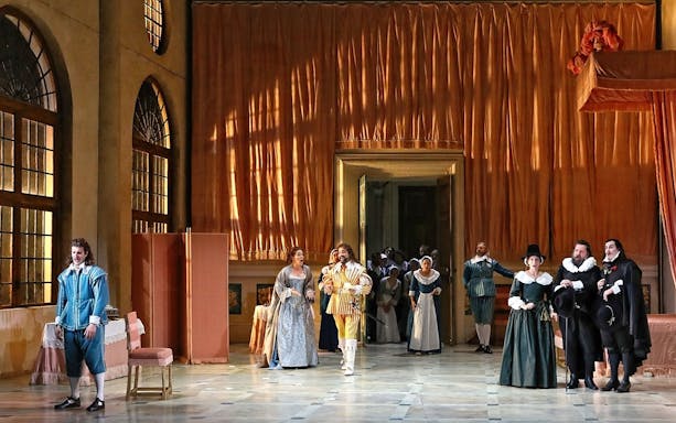 Opera performance of "The Marriage of Figaro" with actors in period costumes on stage.