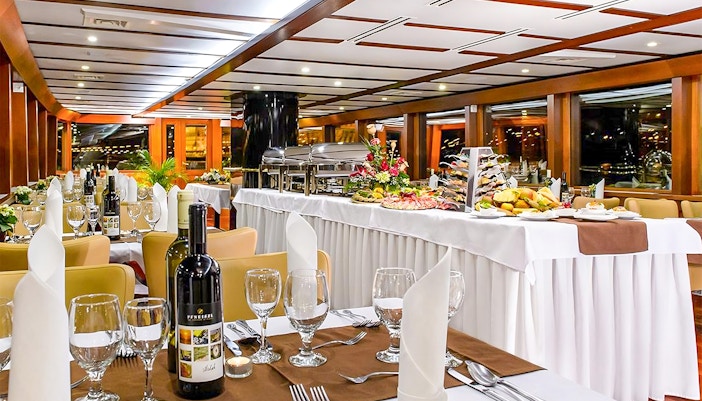 Budapest dinner cruise dining room with live music setup.
