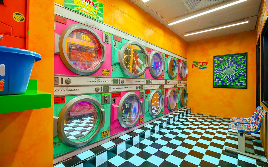 Colorful retro laundromat installation at House of Hype, Dubai.