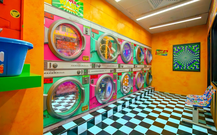 Colorful retro laundromat installation at House of Hype, Dubai.