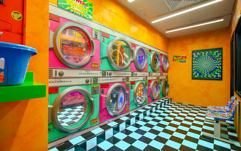 Colorful retro laundromat installation at House of Hype, Dubai.