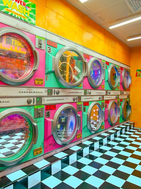 Colorful retro laundromat installation at House of Hype, Dubai.