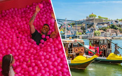 Man enjoying pink ball pit at Pink Palace, WOW cultural district, Porto.