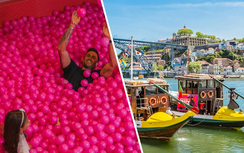 Man enjoying pink ball pit at Pink Palace, WOW cultural district, Porto.
