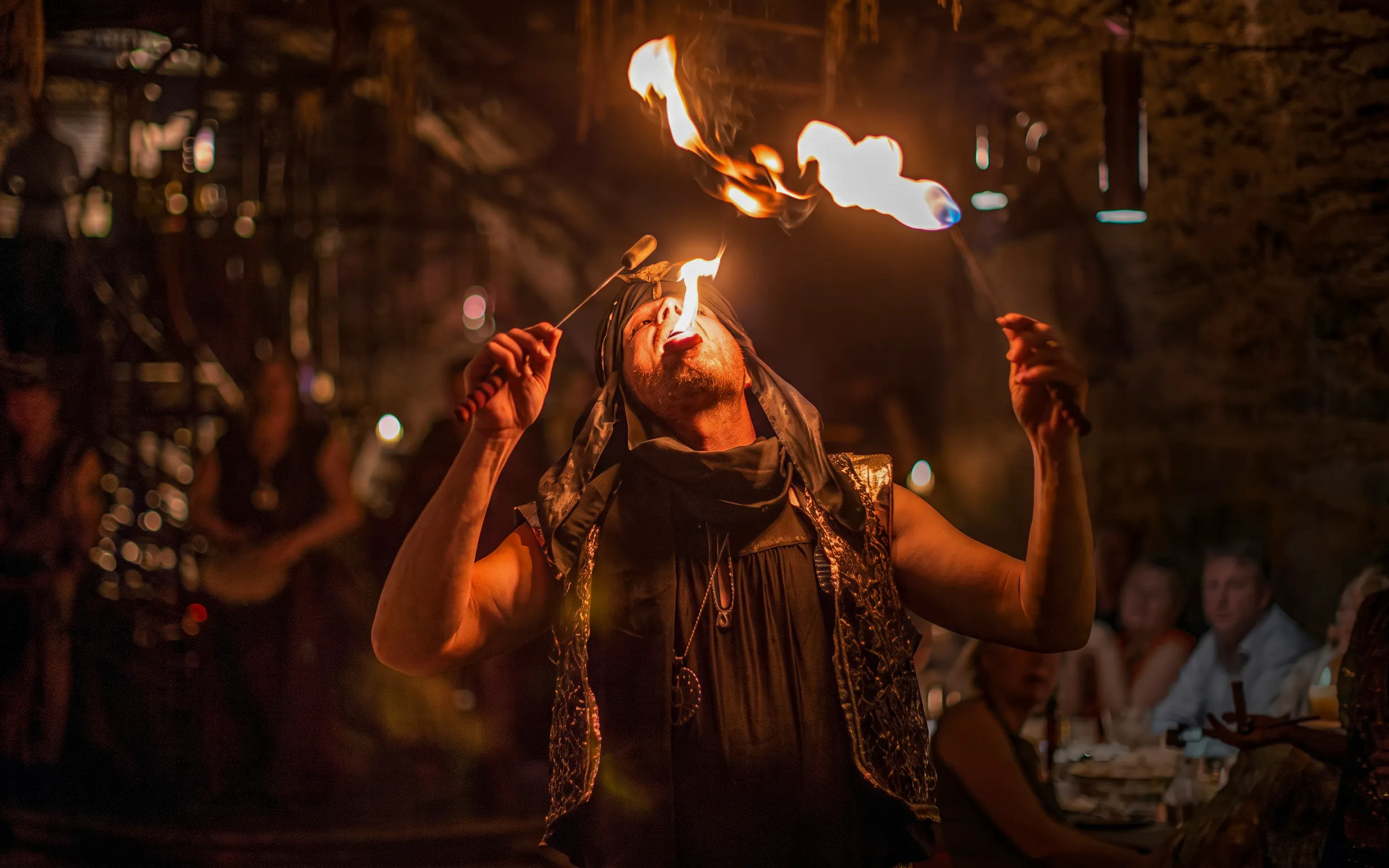 Fire performer at Medieval Dinner Show in Prague.