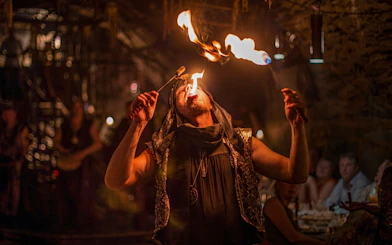 Fire performer at Medieval Dinner Show in Prague.