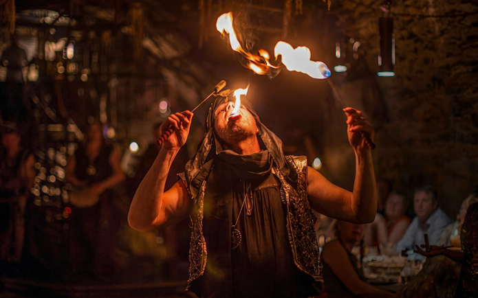 Fire performer at Medieval Dinner Show in Prague.