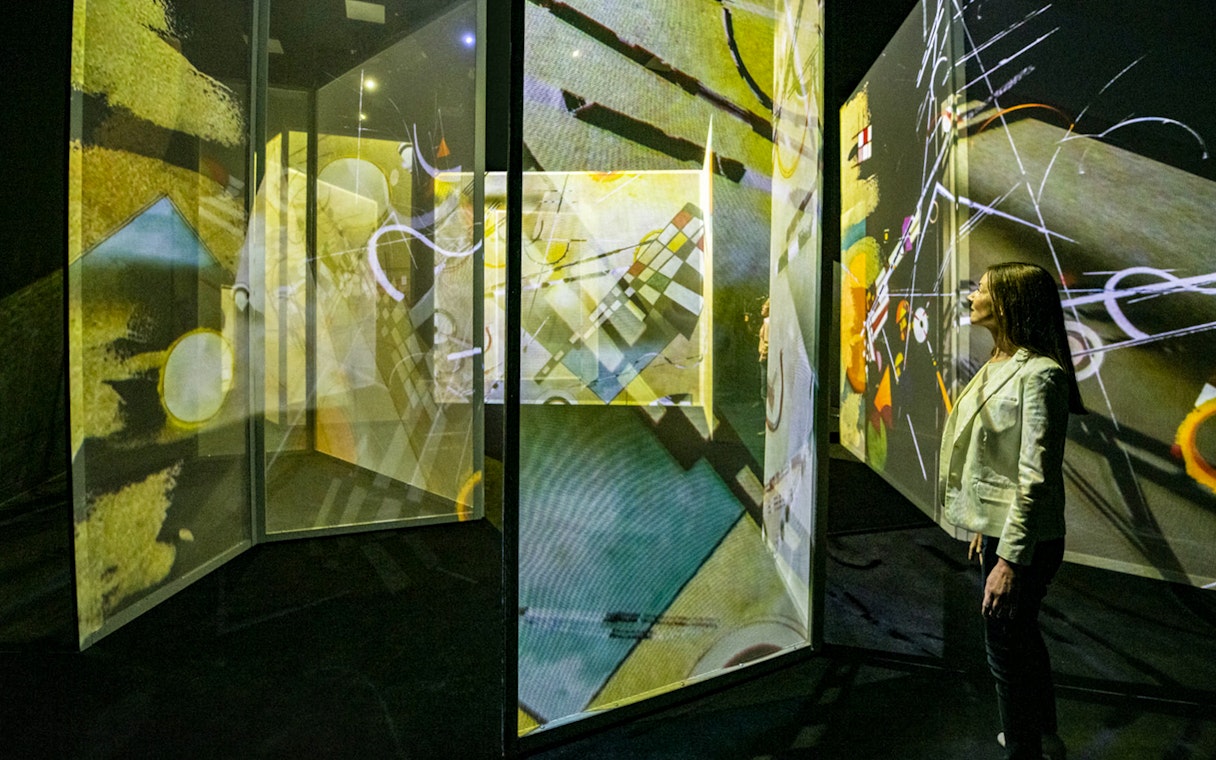 Immersive digital art display at Frameless London exhibition.