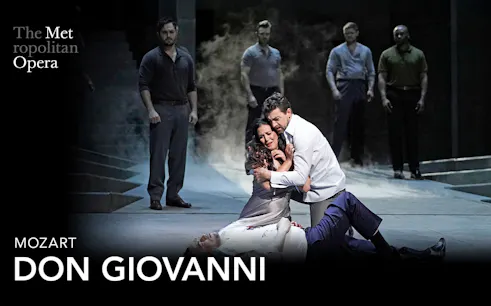 Opera performers in a dramatic scene from Don Giovanni at the Metropolitan Opera.