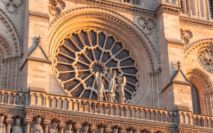 Notre Dame Cathedral facade with detailed rose window, Paris.