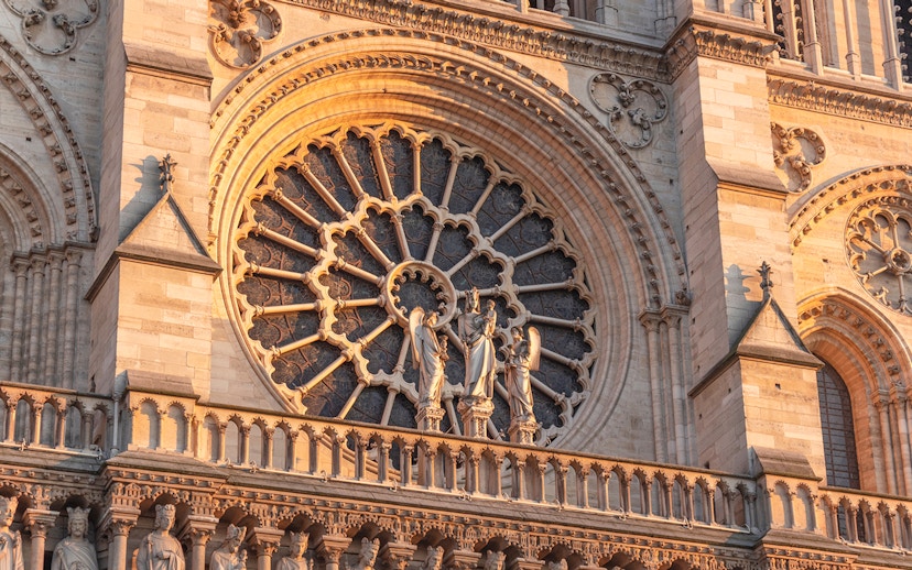 Notre Dame Cathedral facade with detailed rose window, Paris.