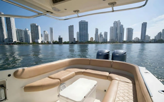 Speedboat interior with view of Cartagena skyline, Rosario Islands tour, Colombia.