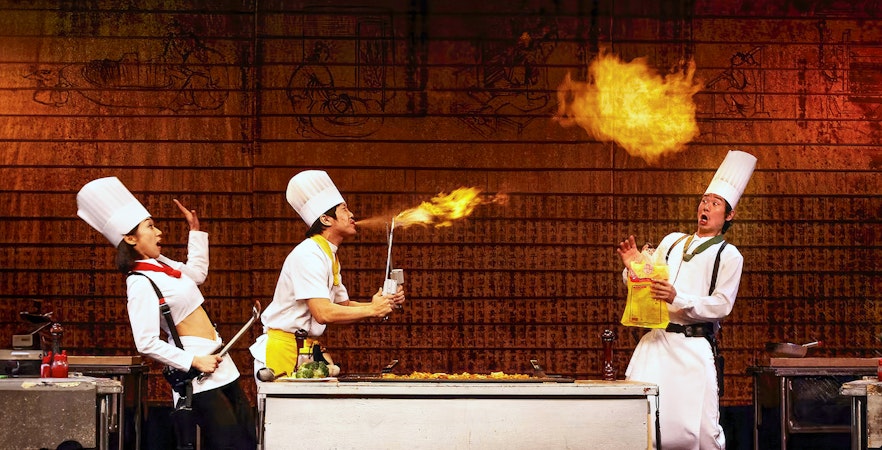 Performers on stage at Seoul's Nanta Show, showcasing traditional Korean drumming and comedy.