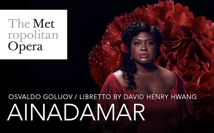 Ainadamar opera promotion at the Metropolitan Opera featuring a performer in red.