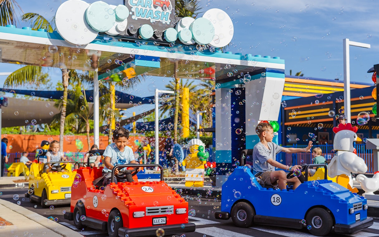 Children driving LEGO cars at Driving School, LEGOLAND® California.