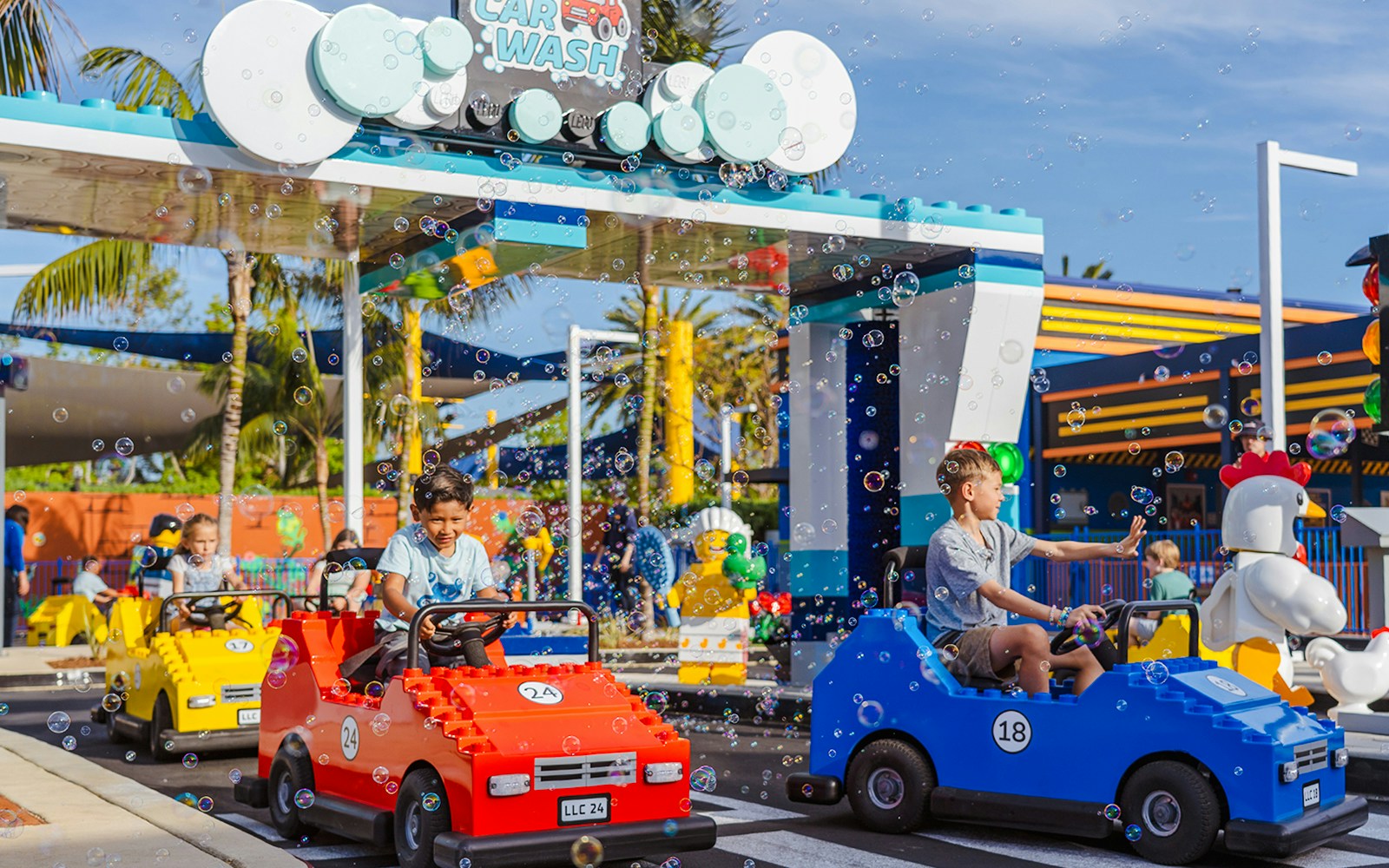 Children driving LEGO cars at Driving School, LEGOLAND® California.