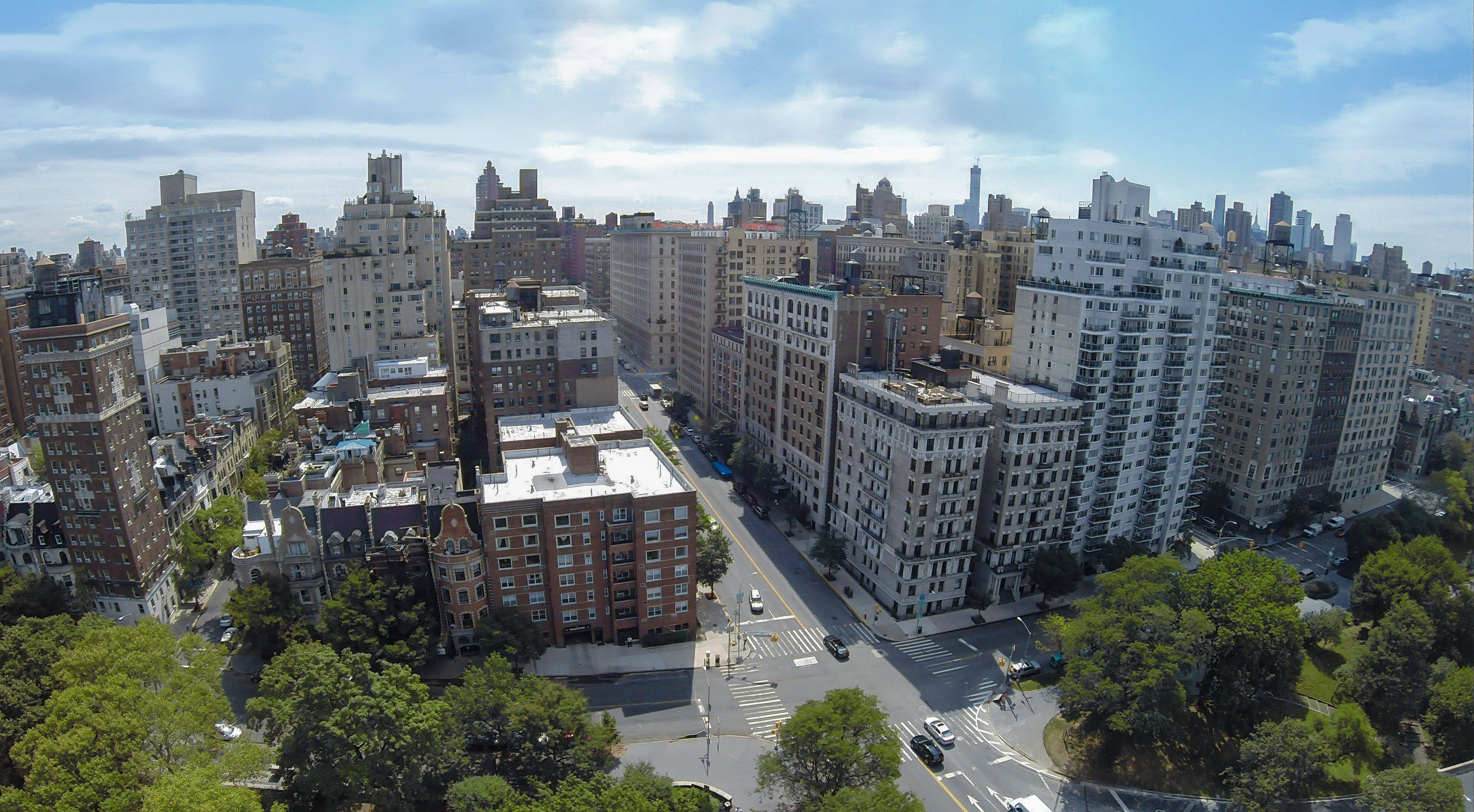 Aerial view of West 79th Street in New York City, showcasing residential buildings and tree-lined streets.