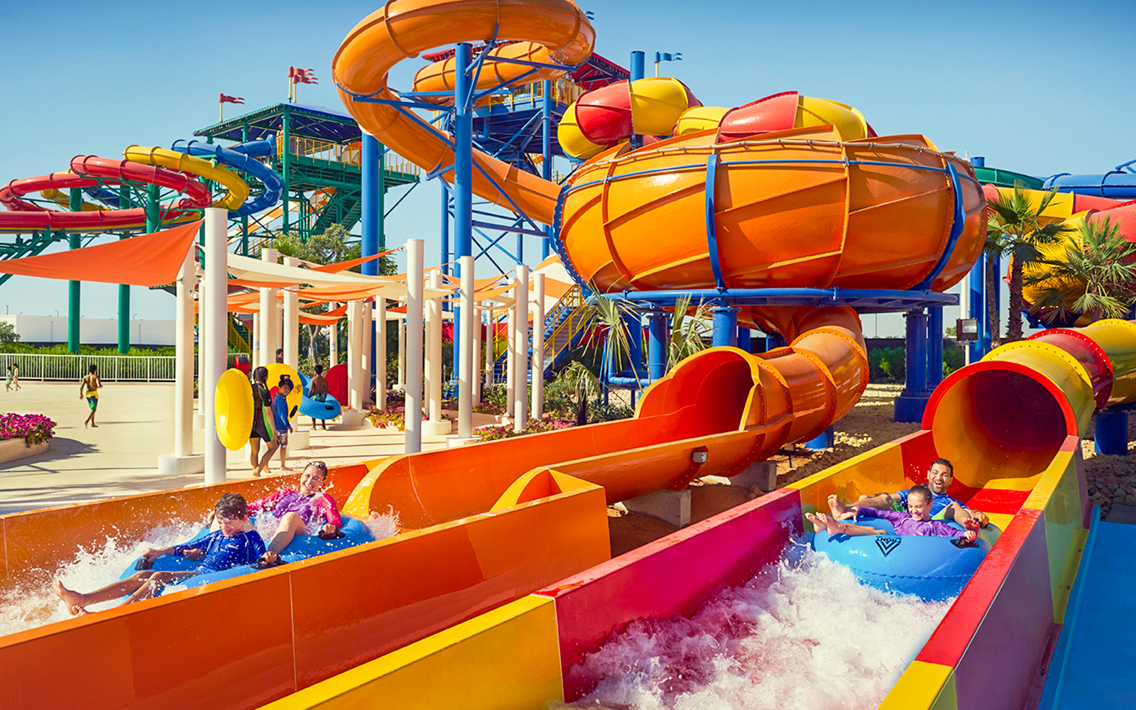Children enjoying water slides at LEGOLAND® Dubai Water Park.