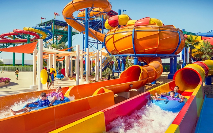 Children enjoying water slides at LEGOLAND® Dubai Water Park.