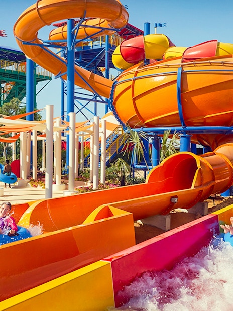 Children enjoying water slides at LEGOLAND® Dubai Water Park.