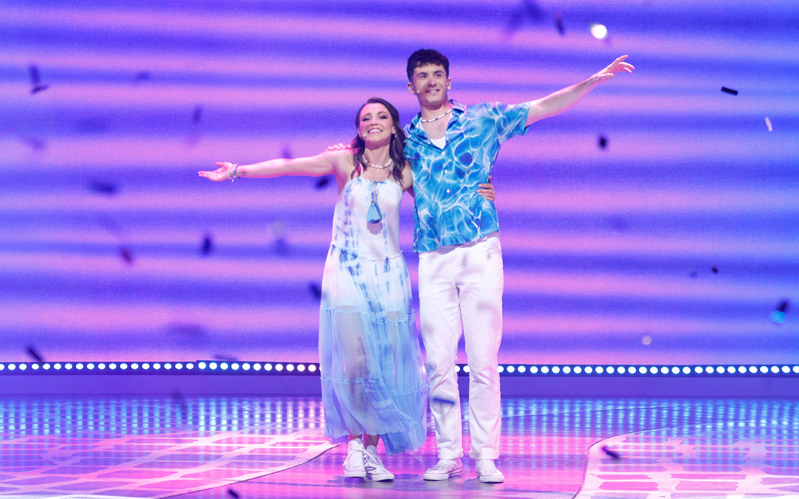 Performers on stage during Mamma Mia! musical show.