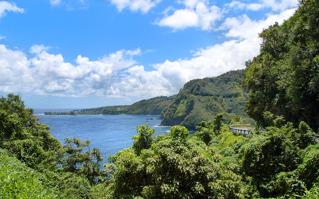 Scenic view of lush greenery and ocean along the Road to Hana Highway, Hana Maui, Hawaii.