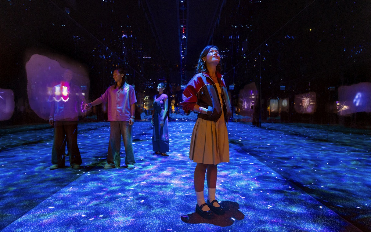 Visitors exploring immersive deep sea exhibit at World of Darkness in Exploria, Mandai Wildlife.