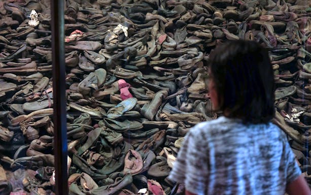 Shoes on display at Auschwitz concentration camp museum exhibit.