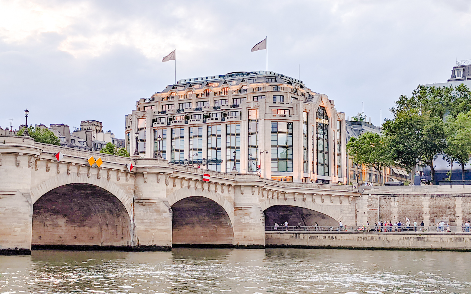 La Samaritaine mall and Pont Neuf bridge during Emily in Paris tour, Paris.