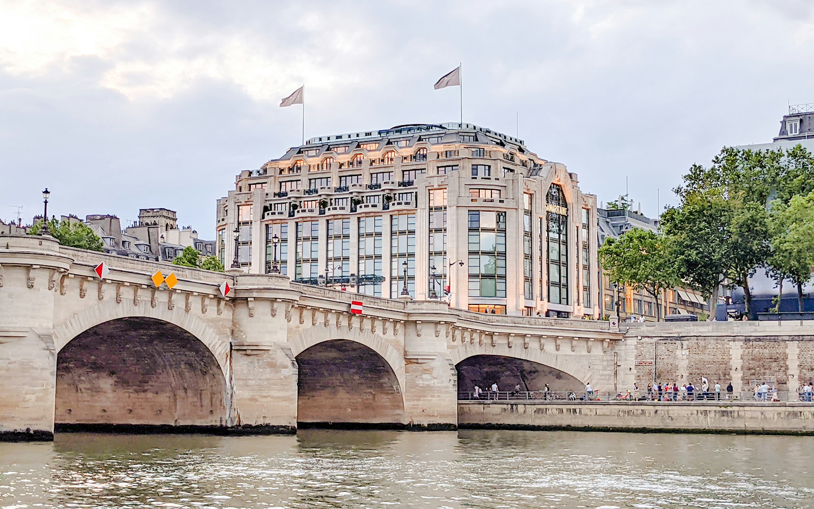 La Samaritaine mall and Pont Neuf bridge during Emily in Paris tour, Paris.