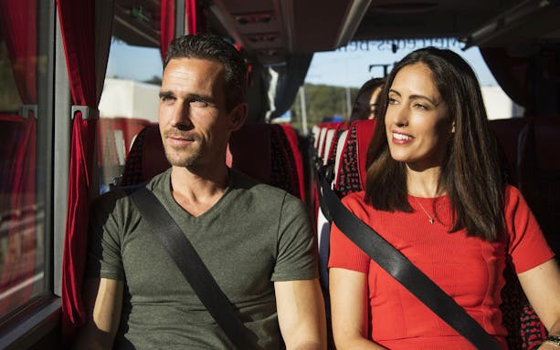 Passengers enjoying a scenic bus ride on the Royal London & Windsor tour.
