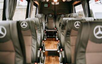 AC bus interior for Parndorf Designer Outlet Shopping Day trip transfers.