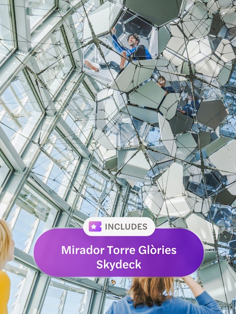 Visitors exploring mirrored structure at Mirador Torre Glòries Skydeck, Barcelona.