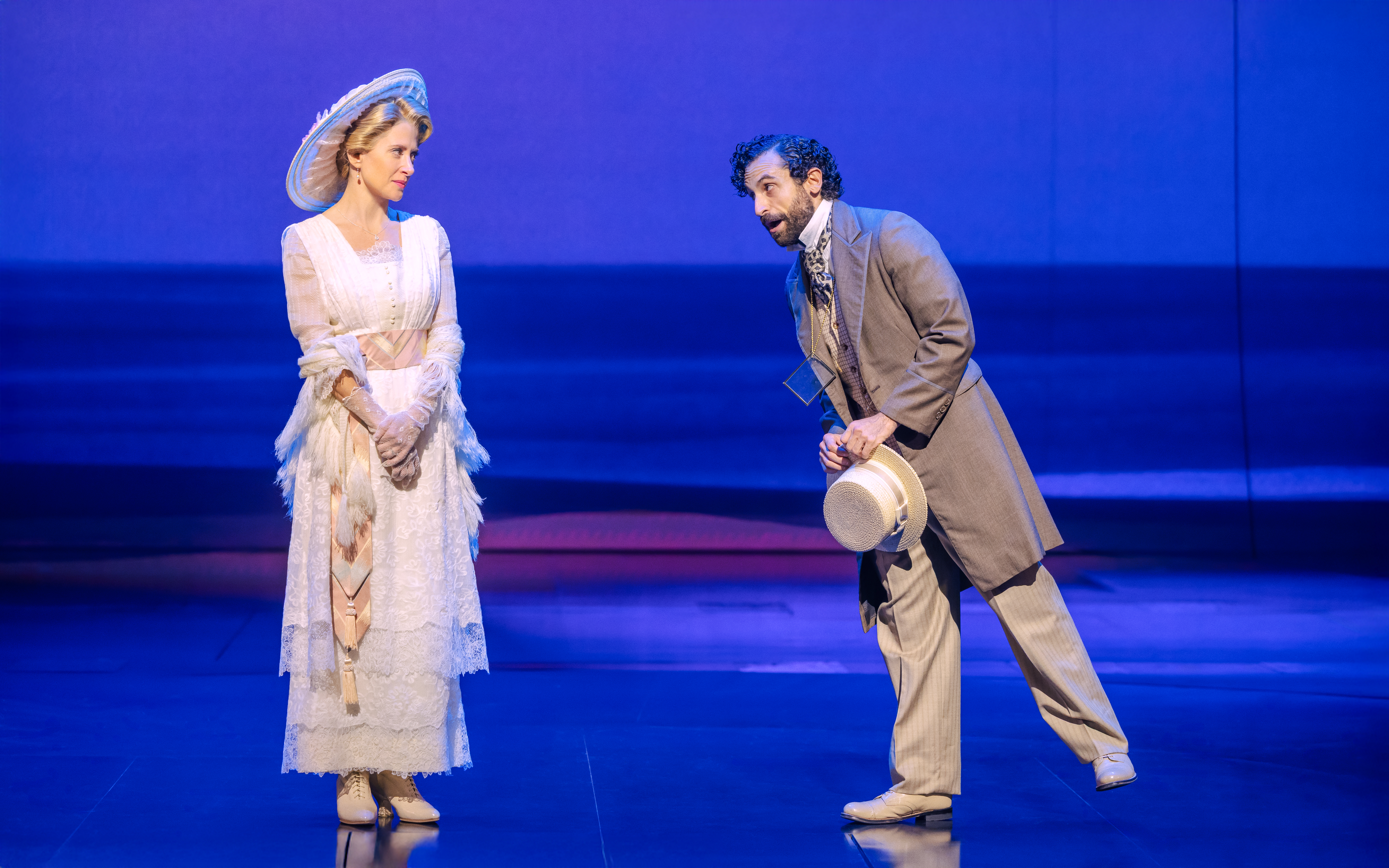 Actors in period costumes performing a scene from the musical Ragtime.