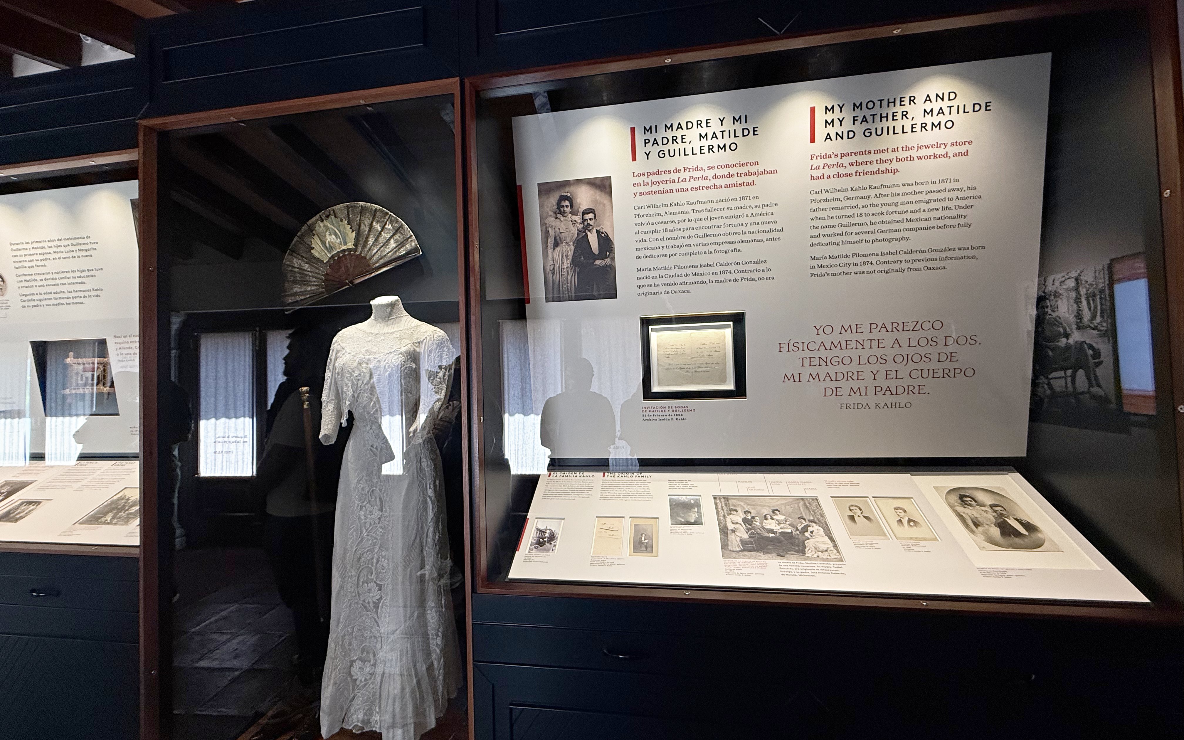 Exhibit at Frida Kahlo Museum featuring family history and a traditional dress.