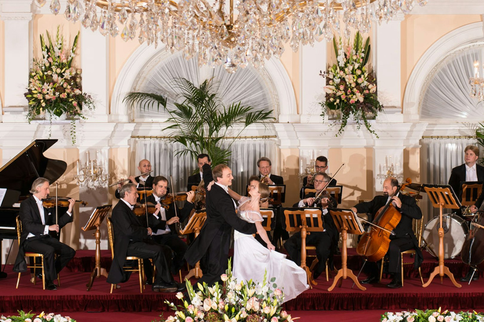 Orchestra performing with dancers at Kursalon Vienna concert.