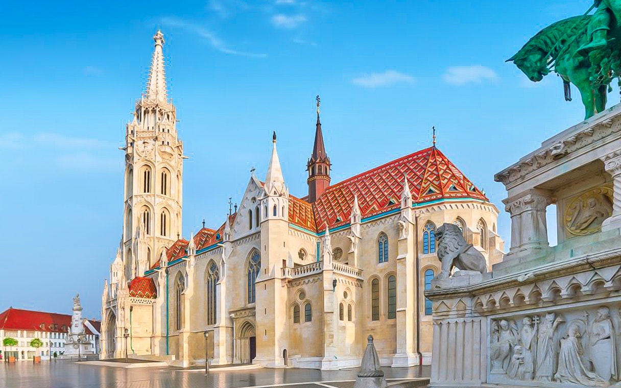 Matthias Church and Holy Trinity Statue in Budapest's Castle District.