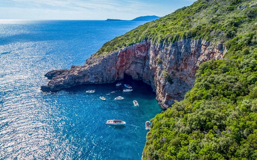Aerial view of boats near cliffs in Kotor Bay, Montenegro.