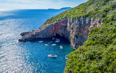 Aerial view of boats near cliffs in Kotor Bay, Montenegro.