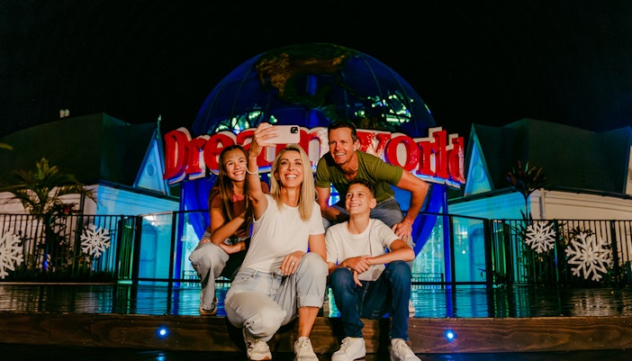 Dreamworld Gold Coast After Dark event with passholders enjoying illuminated rides and attractions.