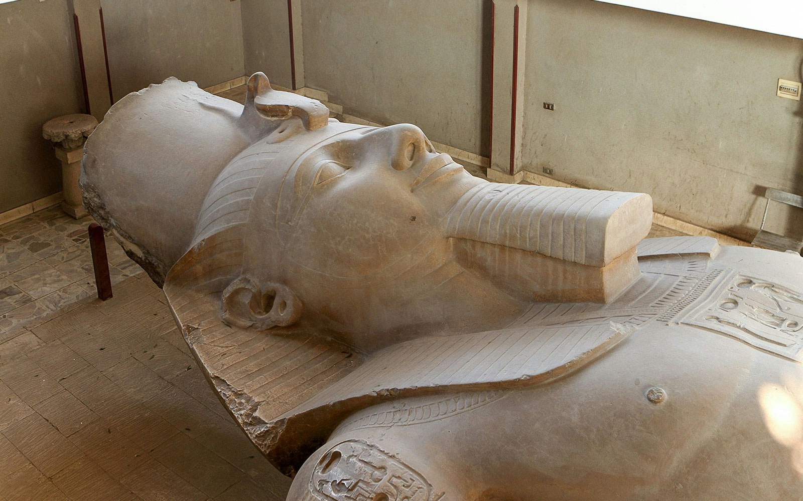 Ramses II statue lying in Memphis, Egypt museum.